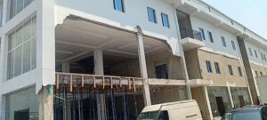 Patched walls at the Magnum Group compound